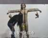 VIDEO: Chinese artist stands on stage half naked receiving love bites for latest bizarre piece
